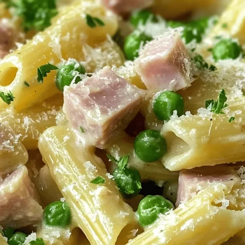 When it comes to comfort food, few dishes can rival the creamy goodness of pasta. Enter Ham & Pea Pasta Delight—an irresistible blend of tender pasta, savory diced ham, and sweet peas enveloped in a rich, velvety sauce. This dish is not only delightful to the taste buds but also a visual treat that brings warmth to the dining table. Whether you're preparing a meal for your family after a long day or hosting a gathering with friends, this recipe offers a harmonious balance of flavors and textures that everyone will enjoy.