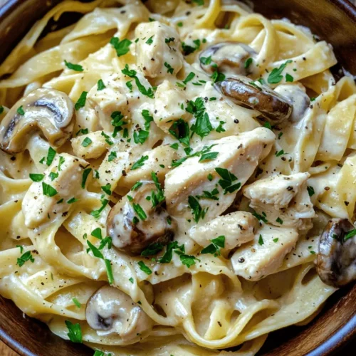 Pasta has long been celebrated as a versatile and beloved dish across cultures, and our Creamy Chicken & Mushroom Pasta recipe brings together the best of both worlds. This delectable meal is a harmonious blend of tender chicken, earthy mushrooms, and a rich, velvety sauce that hugs every strand of fettuccine, making it a comforting choice for any occasion. Whether you're preparing a weeknight dinner for your family or impressing guests at a gathering, this recipe is sure to be a hit thanks to its simplicity and robust flavors.