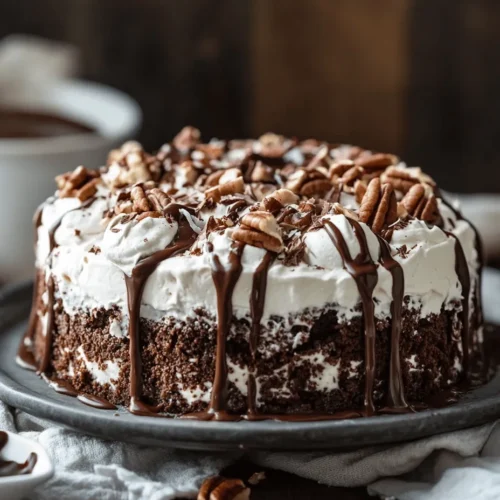 If you’re searching for a dessert that perfectly embodies indulgence and nostalgia, look no further than German Chocolate Poke Cake. This delightful treat is a modern twist on the classic German chocolate cake, featuring a rich chocolate base, decadent fillings, and a luscious topping that is sure to impress. The appeal of this cake lies not only in its taste but also in its irresistible texture—a moist cake punctured with sweet fillings that create a symphony of flavors in every bite.