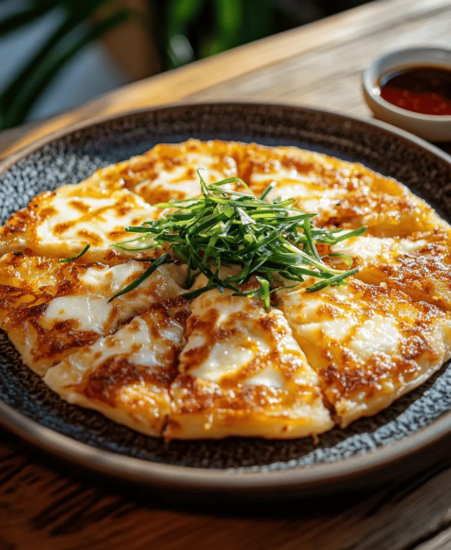 Discover the delightful world of crispy cheesy gamjajeon, a traditional Korean potato pancake that beautifully merges the flavors of tender potatoes and melted mozzarella cheese. This dish is not only a treat for the taste buds but also a versatile option for any meal of the day. Whether served as a savory breakfast, a hearty snack, or a delightful side dish during dinner, gamjajeon is bound to impress. The crispy exterior, combined with the gooeyness of cheese, creates a satisfying texture that will keep you coming back for more.